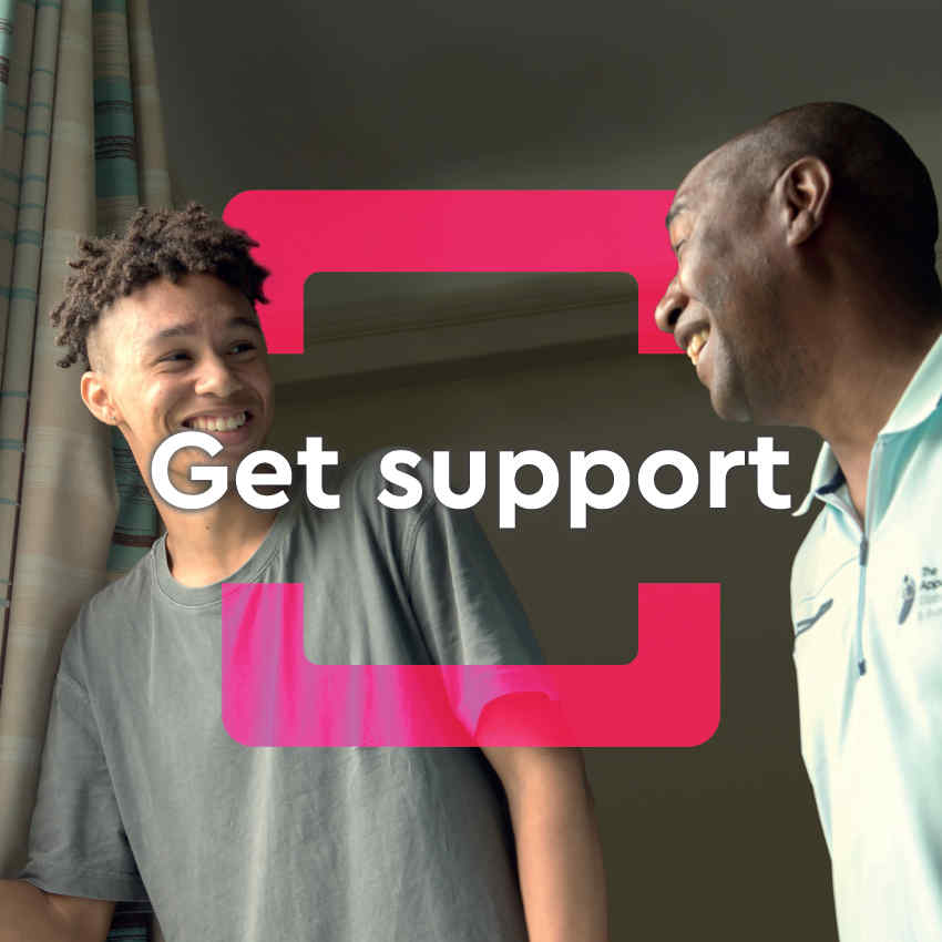 Get support - image of a young man and an older man, both smiling